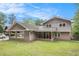 A cozy home featuring a screened porch, a two-car carport, and a well-maintained lawn, ideal for Gathering gatherings at 2657 Langland Ne Ct, Atlanta, GA 30345