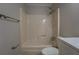 Clean bathroom featuring a shower-tub combo, toilet, and a white vanity at 308 Tulipwood Sw Cir, Conyers, GA 30094
