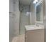 Bathroom features a marble-tiled shower, white vanity, and stylish finishes at 308 Tulipwood Sw Cir, Conyers, GA 30094