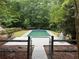 Fenced in backyard featuring a refreshing in-ground swimming pool at 308 Tulipwood Sw Cir, Conyers, GA 30094