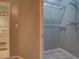 Walk-in closet with wire shelving on the right and a peek into the bathroom at 308 Tulipwood Sw Cir, Conyers, GA 30094