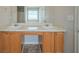 Bathroom vanity featuring double sinks with lots of cabinet space and a view of the tub at 4932 Wilkins Station Dr, Decatur, GA 30035