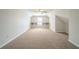 Spacious bonus room with neutral carpet and bright natural light at 4932 Wilkins Station Dr, Decatur, GA 30035