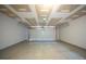 Empty garage featuring an insulated ceiling and a roll-up garage door at 4932 Wilkins Station Dr, Decatur, GA 30035