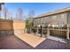 Wood back deck with metal railing for outdoor enjoyment and relaxation at 911 Telfair Close, Sandy Springs, GA 30350