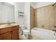 Bathroom features a single sink vanity with a shower-tub combo and tiled floors at 911 Telfair Close, Sandy Springs, GA 30350