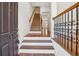 Inviting entryway showcasing hardwood floors and a staircase leading to the upper levels of the home at 911 Telfair Close, Sandy Springs, GA 30350