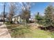 View of the backyard of the home showing fence and some of the neighboring properties at 3670 Union Ave, Atlanta, GA 30354