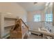 Charming bathroom featuring black and white tile floors, a vintage tub, and custom shelving at 3670 Union Ave, Atlanta, GA 30354