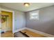 Comfortable bedroom featuring hardwood floors, soft, neutral colors, and closet at 3670 Union Ave, Atlanta, GA 30354