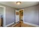 Bedroom with hardwood floors, soft grey-painted walls, and a closet or storage room at 3670 Union Ave, Atlanta, GA 30354
