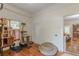 A bedroom featuring hardwood floors and a pet bed at 3670 Union Ave, Atlanta, GA 30354