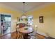 Cozy dining area with hardwood floors and ample sunlight, perfect for casual meals or intimate gatherings at 3670 Union Ave, Atlanta, GA 30354