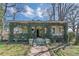 Charming home with a covered front porch draped in mature vines at 3670 Union Ave, Atlanta, GA 30354