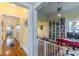 Hallway featuring hardwood floors and access to multiple rooms throughout the home at 3670 Union Ave, Atlanta, GA 30354