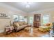 Bright living room featuring hardwood floors and large windows allowing for great light at 3670 Union Ave, Atlanta, GA 30354