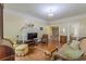 Comfortable living room showcasing hardwood floors and a decorative fireplace at 3670 Union Ave, Atlanta, GA 30354
