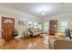 Bright living room featuring hardwood floors and large windows allowing for great light at 3670 Union Ave, Atlanta, GA 30354