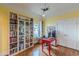 Inviting home office with hardwood floors, built-in bookshelves, and natural light at 3670 Union Ave, Atlanta, GA 30354