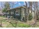 Covered porch on a vintage home featuring a lawn with green grass at 3670 Union Ave, Atlanta, GA 30354