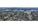 This aerial view showcases a vibrant community with tree-lined streets and a manicured soccer field, near downtown Atlanta at 1069 Falling Water Se Dr, Smyrna, GA 30080