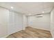 Finished basement featuring new floors, closet, and efficient AC wall unit at 1069 Falling Water Se Dr, Smyrna, GA 30080