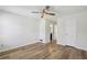 This bedroom features neutral walls, wood floors, and a ceiling fan at 1069 Falling Water Se Dr, Smyrna, GA 30080