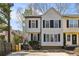 Two-story home with black shutters and a well-manicured front yard at 1069 Falling Water Se Dr, Smyrna, GA 30080