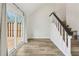 Living room with a glass sliding door providing access to a wooden deck at 1069 Falling Water Se Dr, Smyrna, GA 30080