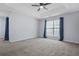 Expansive bedroom with lots of natural light and carpeted floors at 2502 Capella Sw Cir, Atlanta, GA 30331