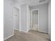 Hallway leads to a bathroom and other rooms, providing easy access throughout the home at 2502 Capella Sw Cir, Atlanta, GA 30331