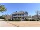 Charming two-story home with a large front yard and inviting wraparound porch at 3440 Caleb Rd, Snellville, GA 30039