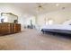 This main bedroom boasts a ceiling fan and adjoins a sitting room at 3440 Caleb Rd, Snellville, GA 30039