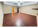 Spacious bedroom features wood-look tile flooring, a ceiling fan, and recessed lighting at 342 Mccurry Rd, Stockbridge, GA 30281