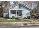 Charming home featuring updated light gray paint and a cozy front porch entrance at 4985 Union St, Union City, GA 30291