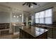 Charming kitchen with a granite-topped island, ample counter space, and modern lighting at 4985 Union St, Union City, GA 30291