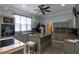 Well-equipped kitchen featuring an island, sleek cabinets, and modern appliances at 4985 Union St, Union City, GA 30291