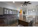 Elegant kitchen with island, stainless steel appliances, and decorative backsplash at 4985 Union St, Union City, GA 30291