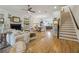 Elegant living area featuring a fireplace, hardwood floors, and neutral-toned furniture at 1041 Endeavour Ct, Marietta, GA 30064