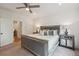 This lovely main bedroom has two mirrored nightstands, a ceiling fan, and ensuite access at 1041 Endeavour Ct, Marietta, GA 30064