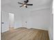 Bedroom featuring light floors, neutral walls, ceiling fan, and white doors at 3565 Collier Drive Nw Rd, Atlanta, GA 30331