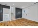 A modern entryway featuring stairs and custom wood paneling at 3565 Collier Drive Nw Rd, Atlanta, GA 30331