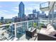 Balcony with city views and outdoor seating at 45 Ivan Allen Jr Nw Blvd # 1908, Atlanta, GA 30308