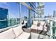 Condo balcony with skyline views and modern outdoor furniture at 45 Ivan Allen Jr Nw Blvd # 1908, Atlanta, GA 30308