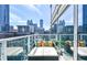 Balcony with cityscape view and a daybed at 45 Ivan Allen Jr Nw Blvd # 1908, Atlanta, GA 30308