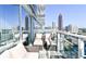 Balcony with plush seating and impressive city views at 45 Ivan Allen Jr Nw Blvd # 1908, Atlanta, GA 30308