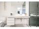 Bright bathroom featuring a sleek vanity with modern fixtures and a glass-enclosed shower at 45 Ivan Allen Jr Nw Blvd # 1908, Atlanta, GA 30308