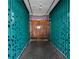 Hallway with modern design elements, unique paneling, and ambient lighting leading to an intriguing destination at 45 Ivan Allen Jr Nw Blvd # 1908, Atlanta, GA 30308