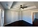 This bedroom has modern decor, a ceiling fan, and a closet with bright natural light at 958 Joseph E Boone Nw Blvd, Atlanta, GA 30314