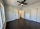 This bright bedroom offers wood floors, ceiling fan, and a closet at 958 Joseph E Boone Nw Blvd, Atlanta, GA 30314